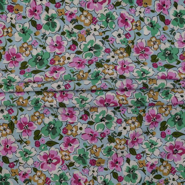 Wiskoza Drukowana Wiosenna Pastelowa Łąka na Błękitnym Tle - Textil World